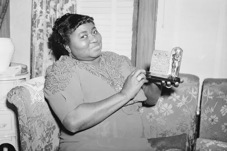 Hattie McDaniel is shown with her Best Supporting Actress award, which she received for her performance in 1939's Gone With the Wind.