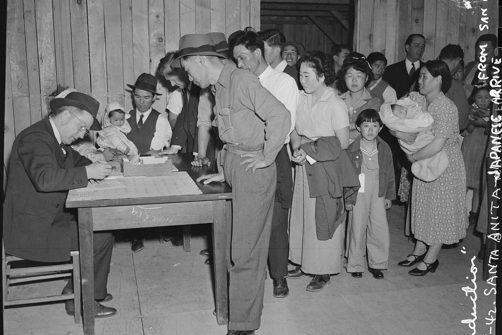 Black and white photo showing Japanese Americans in Arcadia, California, during World War II