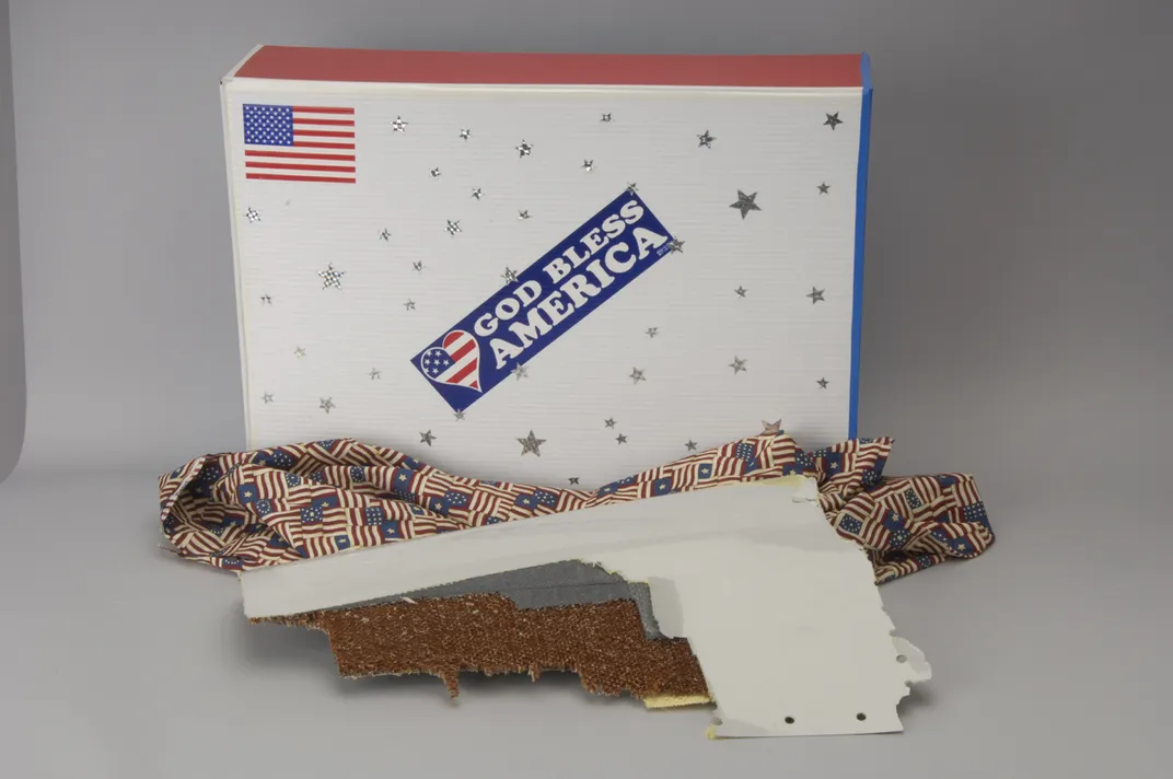 Flight 77 airplane fragment in patriotic box