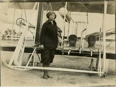 Ruth Law stands in front of her Wright Model B biplane at the New York State Fair, Yonkers, 1913.