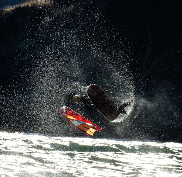 Christopher MacDonald kiteboarding at Sunset. thumbnail