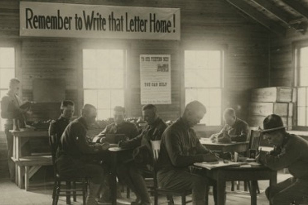 World War I soldiers writing letters home