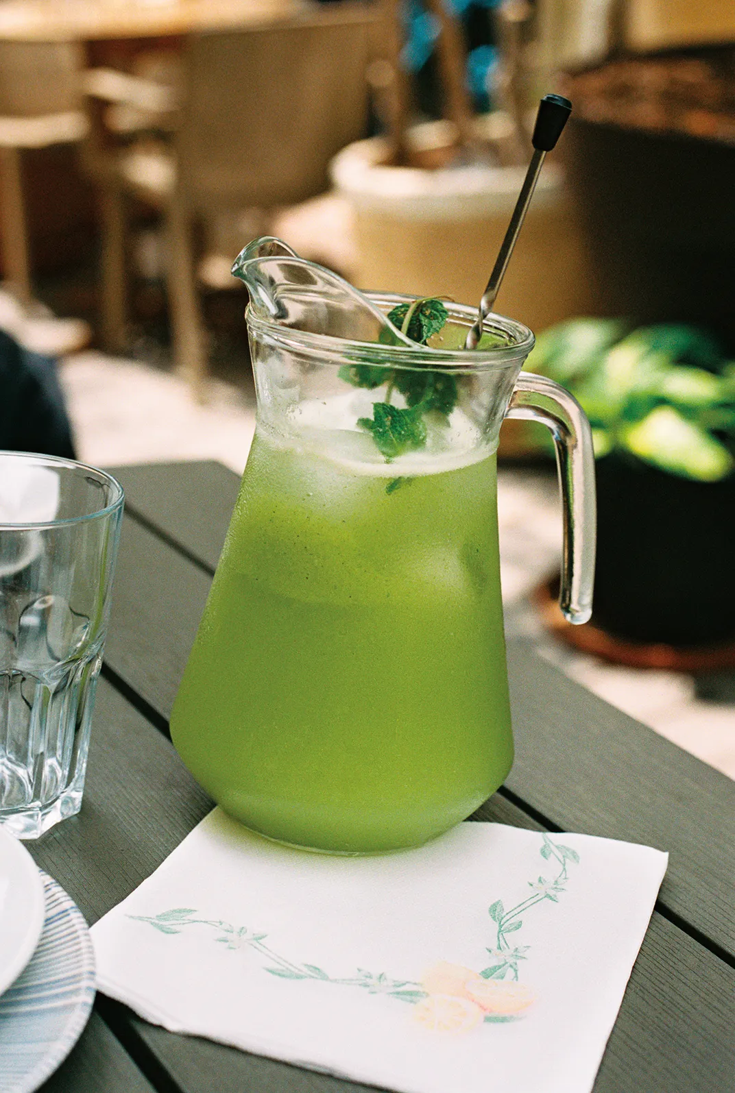 a pitcher of green lemonade
