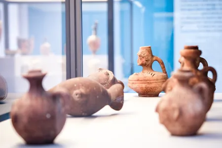 The exhibition includes pieces of ancient pottery.