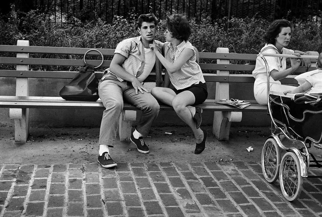A couple on a park bench