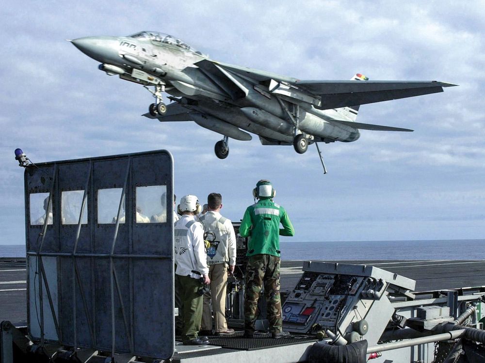 F-14 Tomcat landing on aircraft carrier