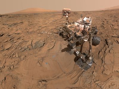 This self-portrait of Curiosity shows the vehicle at a drilled sample site called "Okoruso," on the "Naukluft Plateau" of lower Mount Sharp. It combines multiple images taken with the Mars Hand Lens Imager (MAHLI) on May 11, 2016, during the 1,338th Martian day.
