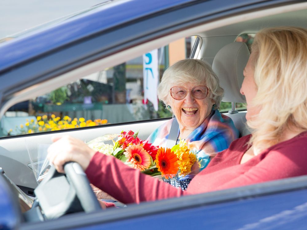 old woman with car trouble