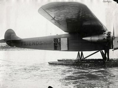 Amelia Earhart and her plane