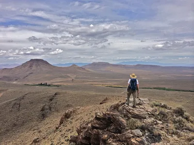A geologist looks out into a caldera in Nevada's McDermitt Volcanic Field.