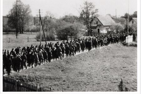 The exhibition includes clandestine photographs of Nazi death marches. This image, taken by Maria Seidenberger, depicts a forced march from Buchenwald to Dachau.
