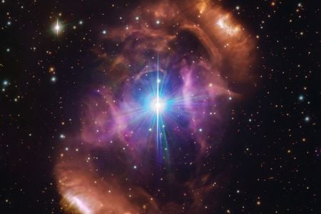 A close-up of the Dragon&#39;s Egg Nebula, with two mismatched stars inside.