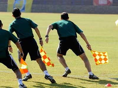 For officials, the road to the World Cup is as competitive and demanding as it is for players.