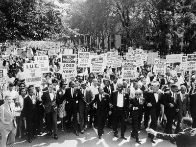 The leaders of the March on Washington link arms.