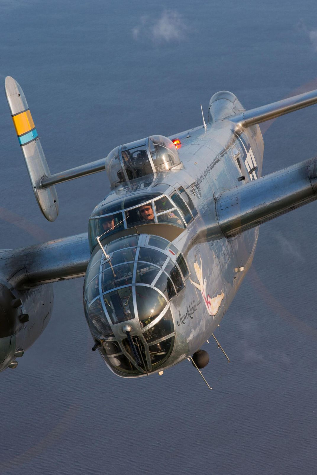 A Commemorative Air Force B-25 flies at Oshkosh in 2014.