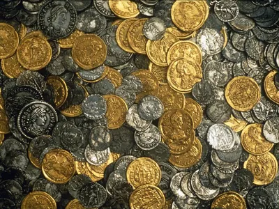 The gold and silver coins in the Hoxne hoard, found in Suffolk, date to the end of the Roman Empire in Britain at the start of the 5th century A.D.