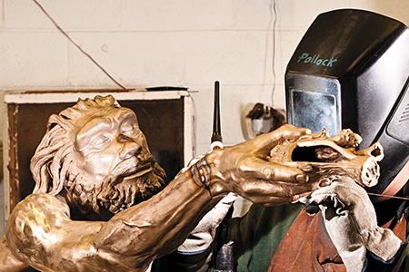 Homo heidelbergensis—one of five sculptures crafted for the new exhibition hall at the Smithsonian National Museum of Natural History—takes shape at a Baltimore foundry.