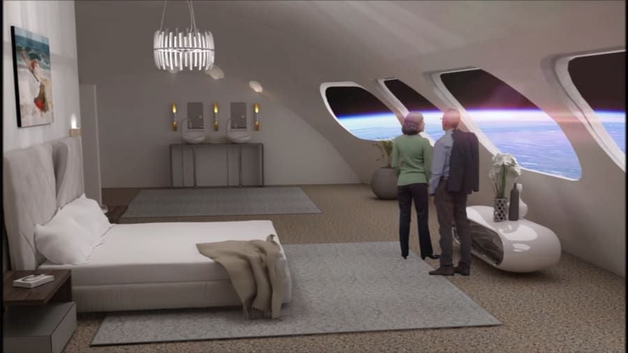 A rendering of how a room on the Voyager Space Station may look like. The room is an open luxary suite and windows overlooking Earth.