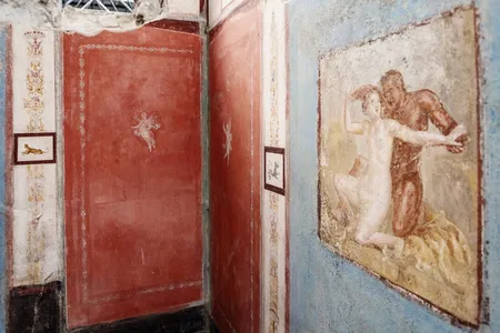 One fresco depicts a satyr and a nymph embracing.
