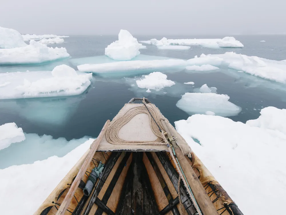 Arctic ice and fishing boat