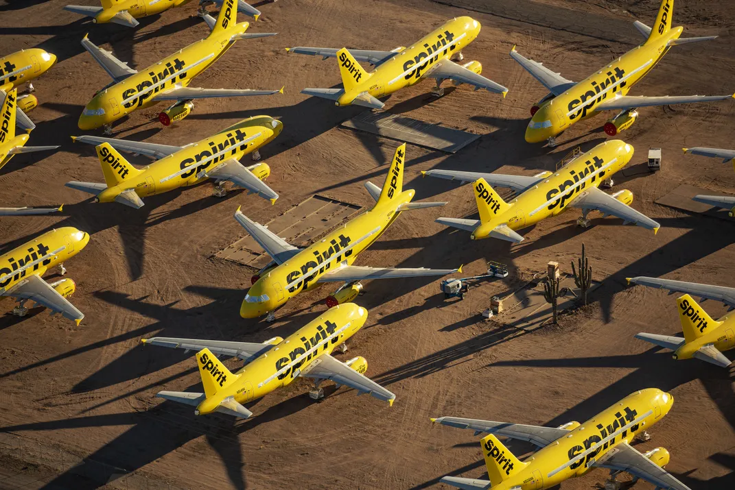 14 - Spirit airline passenger planes, grounded during the Covid-19 pandemic that halted many forms of mass transit to help prevent the spread of the virus, are parked in the desert.