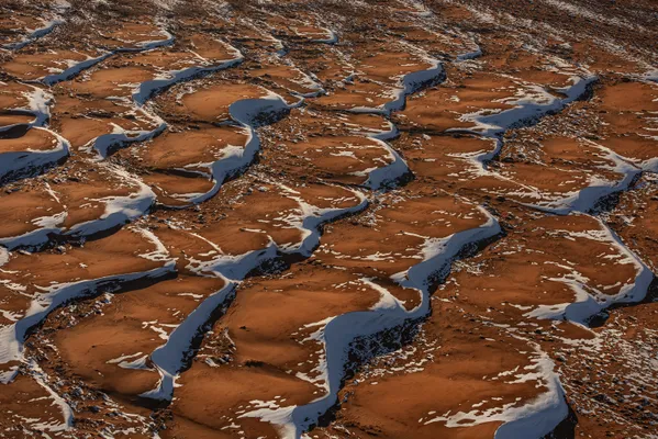 Dunes of sand and snow thumbnail