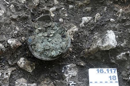 The clay pot contained 1,290 Roman coins.