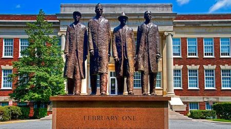 The “Greensboro Four,” above immortalized on their North Carolina A&T State University campus, fought racial segregation by refusing to leave a local retail store when the staff would not serve them coffee. Learn to protest like a pro this weekend at the American History Museum.