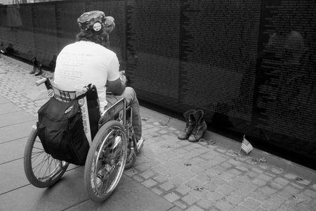 A veteran visits the Vietnam War Memorial in Washington, D.C. in 1988.