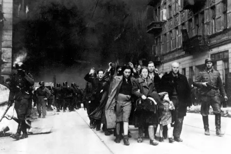 Jews being led for deportation in the Warsaw Ghetto, during the Warsaw Ghetto Uprising in 1943.