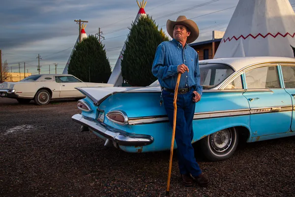 A Cowboy Watches the Setting Sun Along Route 66 thumbnail