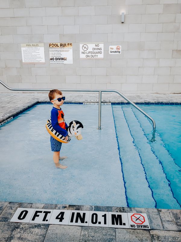 A Reluctant Swimmer in Hotel Pool thumbnail