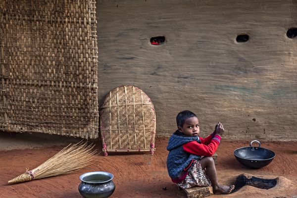 A Morning Wait: Boy Beside the Earthen Oven thumbnail