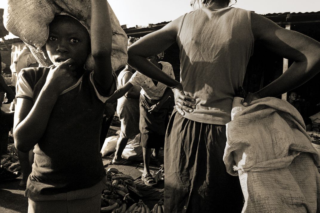 Haitian girl in Port-au-Prince marketplace | Smithsonian Photo Contest ...