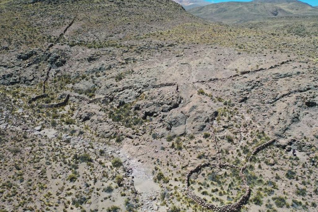 Overhead view of stone structures on landscape