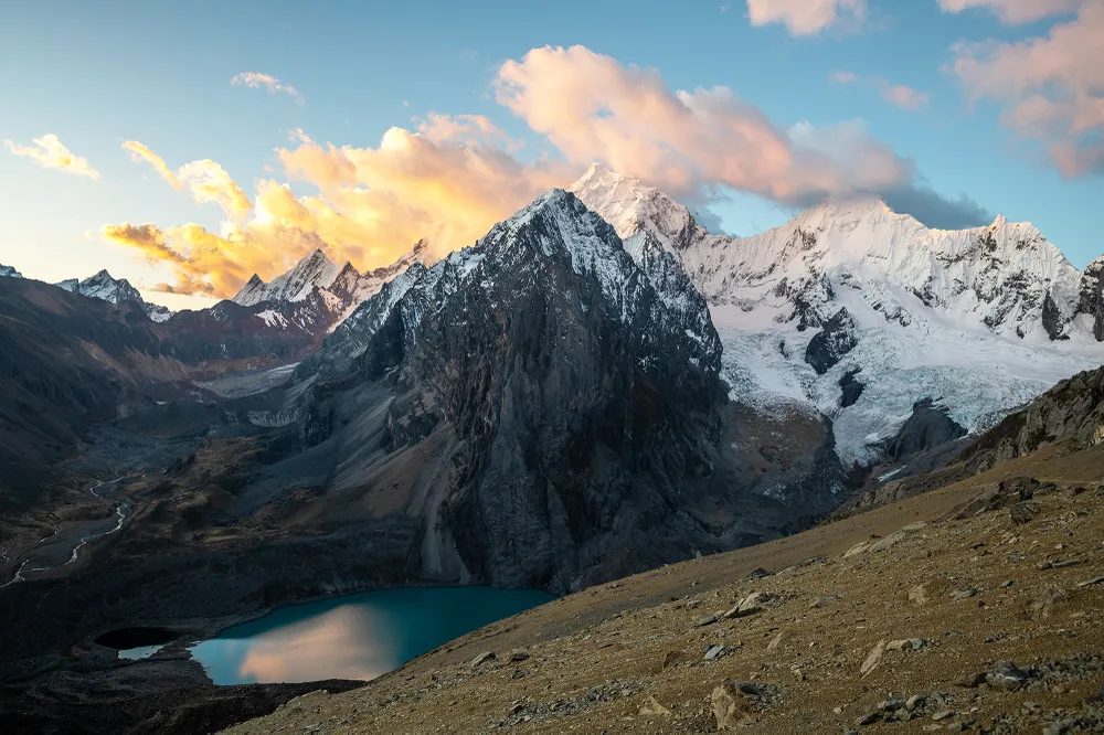 I hiked up from camp 2,000 vertical feet to take in the splendor of a sunset near Paso Santa Rosa in the Cordillera Huayhuash, Peru. Fortunately, it was a beautiful one.