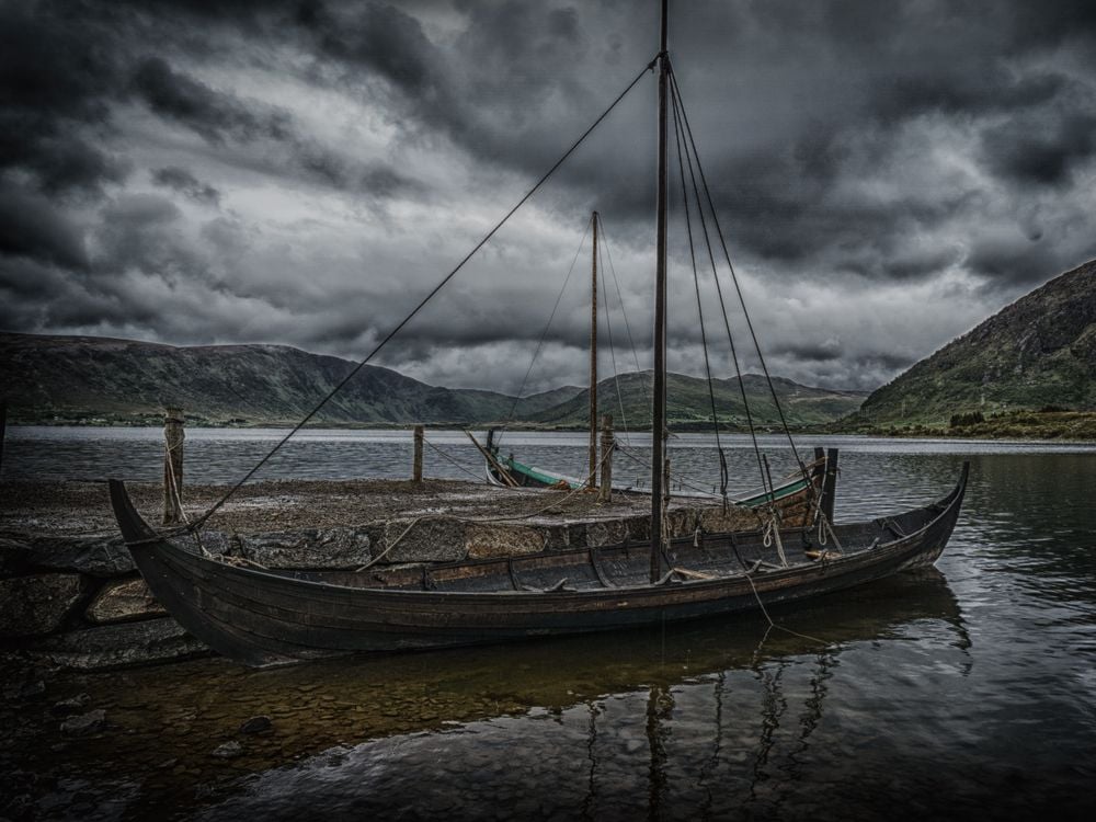 Long boat sits on a dock