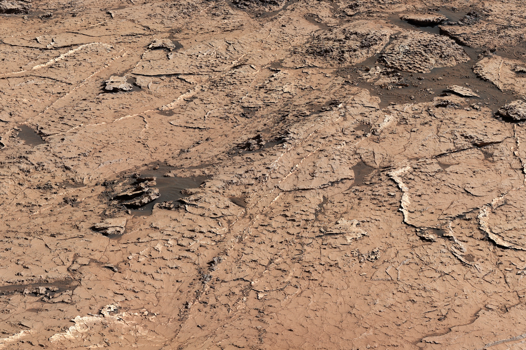 the surface of mars with a pattern of ridges