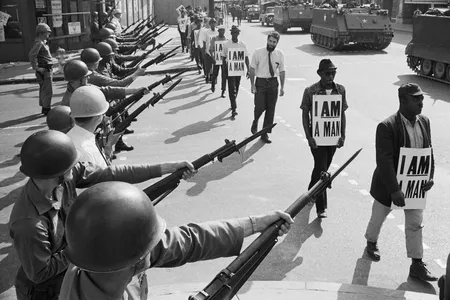 National Guard troops lined Beale Street during a protest on March 29 , 1968. “I was in every march, all of ’em, with that sign: I AM A MAN,” recalls former sanitation worker Ozell Ueal.