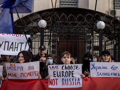 Protesters gather outside of Kyiv in response to Russia&#39;s invasion of Ukraine.