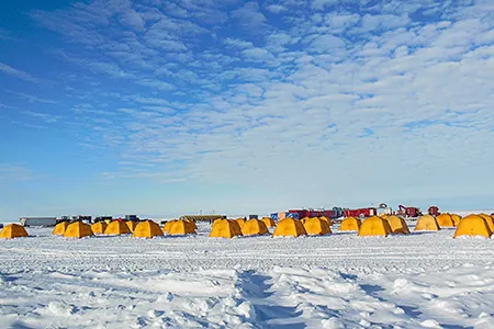 Members of the Lake Whillans drill team lived in yellow tents studding the Antarctic landscape.