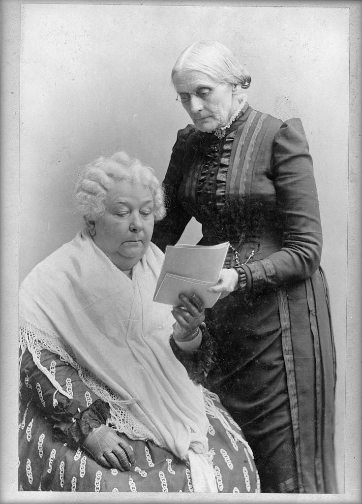Suffragists Elizabeth Cady Stanton (seated) and Susan B. Anthony (standing)