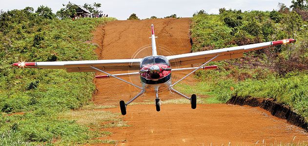 Bush flying has unique challenges. This Quest Kodiak gets a little extra thrust on takeoff from the slope of a dirt airstrip carved out of a hill in East Kalimantan, Indonesia.