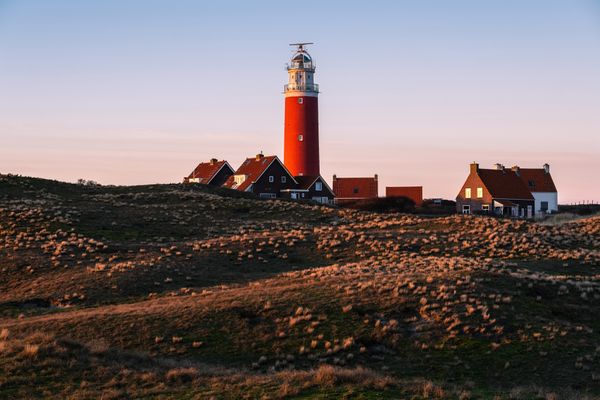 Texel lighthouse at sunset thumbnail