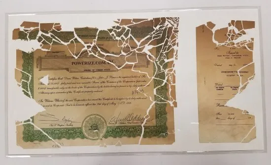The stock certificate pieced back together and encased in mylar (NMAH)
