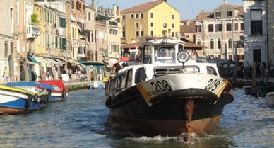 While gondolas are romantic, to get around Venice quickly and cheaply, you’ll need to take motorized bus-boats called vaporetti.