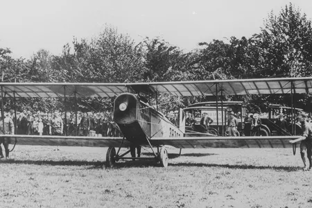 A Curtiss "Jenny" biplane carrying mail for Philadelphia, Pennsylvania, before takeoff from the Polo Grounds in Washington, D.C.