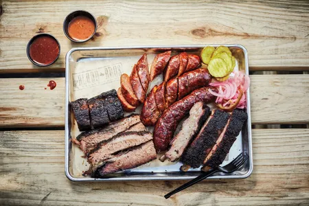 The Texas trinity of sausage, ribs and brisket, with a house blend of spices added to the crust. 