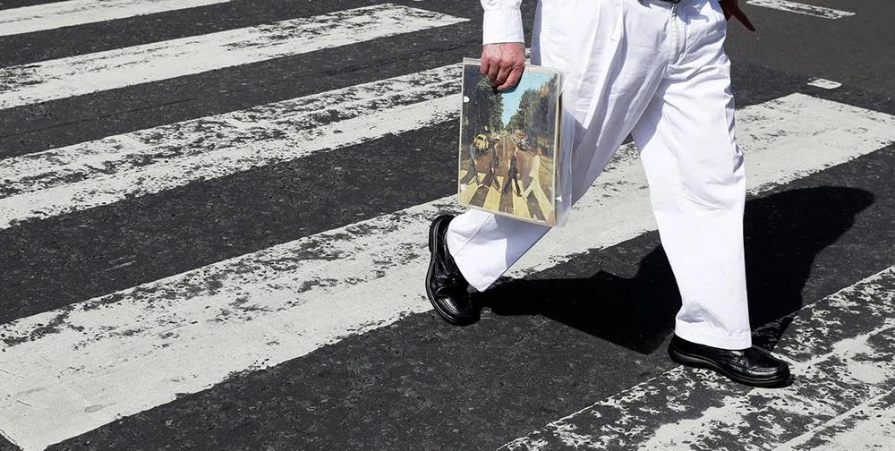Crossing street with Abbey Road album.jpg