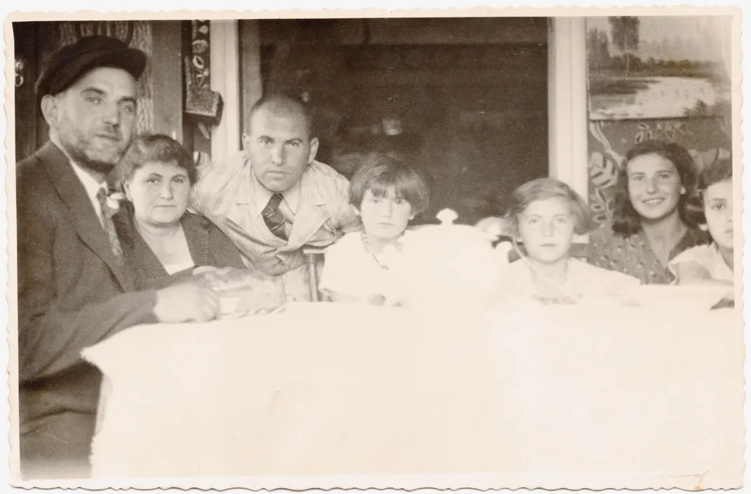 Shmiel, Ester, Bruno, Ruchele, Bronia, Lorka and Frydka Mendelsohn in Bolechow, Poland, in 1934